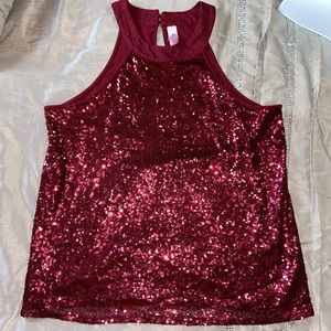 Pretty red sequinned top.